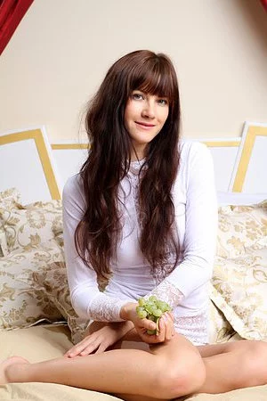 One of a kind long haired brunette honey Lauren Lace is showing off in this softcore gallery.