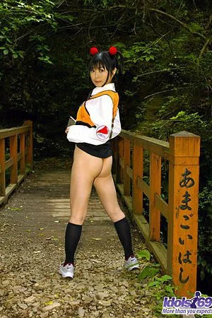 Asian college girl Kuramoto Anna is flashing the nude up skirt and downblouse outdoor