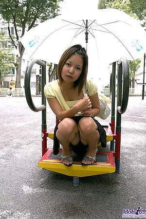 Asian darling Mari Idols is ready to pose and show off her body and nice hard nipples.