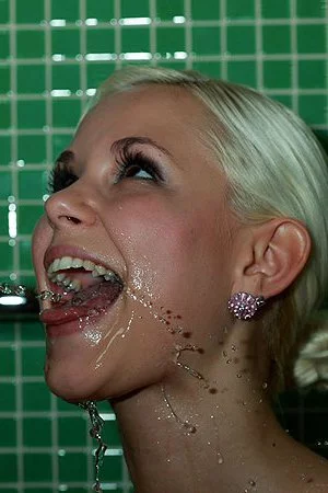 Catching piss is something Lola Myluv loves doing when her pussy is pleased with dick.