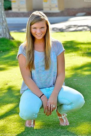 Seducing young bimbo Melissa May masturbates the adorable pussy with lollipop