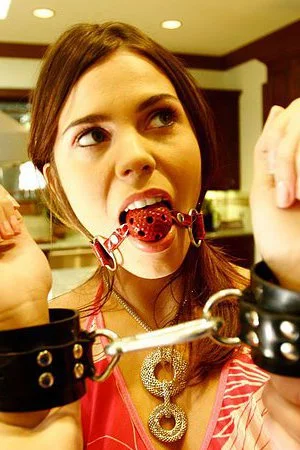 Izzy Bella Blu gets handcuffed and ballgagged before man drills her pussy