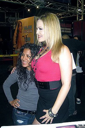 Alexis Texas and other pornstars are clothed posing for camera in their daily life