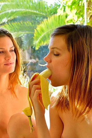 Naughty lesbian babes Romi FTV and Raylene FTV are playing bananas over each otherâ€™s cunt