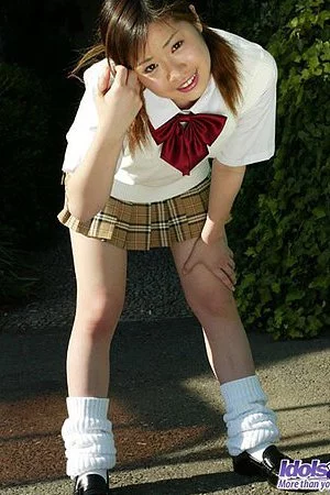 Horny Asian college girl Yuka Idols is stripping until the erotic red lingerie