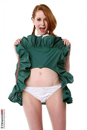 There are not many redhead babes like horny Lucie T. The time has come for her to strip.