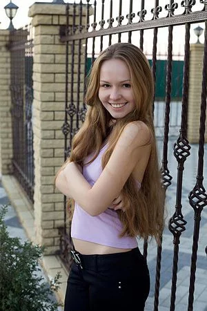 Baring her sexy lingerie naughty girl Virginia Sun poses and seduces with her pussy