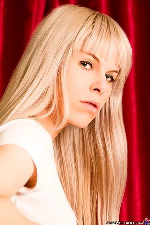 When this naked blonde Gwenevere Afterlife bends over you can see her shaved holes