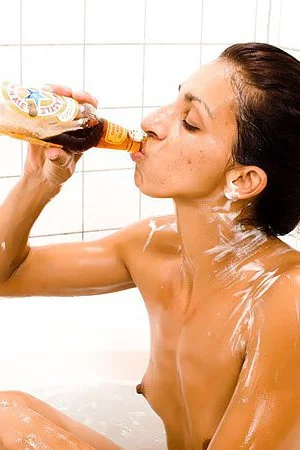 Cute brunette Madrid Afterlife washing the hot shaved body in the bath tub