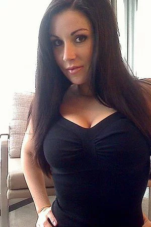 Big boobed brunette temptress Sweet Krissy is very proud of her round ass