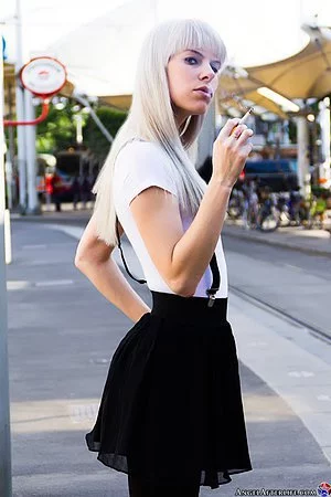 Walks around the city for blonde babe Gwenevere Afterlife smoking and looking around