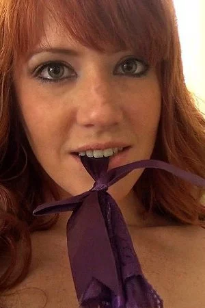 The redhead teen Elle Elexandra is playing with panty and then filling nub hole with sex toy