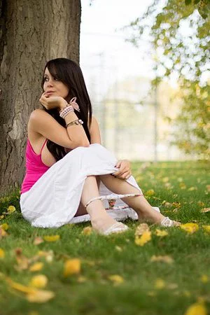 Horny busty brunette cutie Bryci gives a hot outdoor striptease and plays with herself