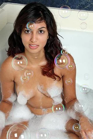 Curly haired Latina Nadia Reid wants to get off as soon as possible in here.