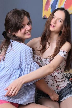 Lucy S and Lizi Vogue playing with various sex toys in bed