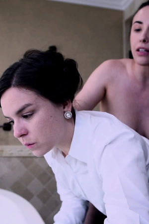 Horny lesbians Juliette March and Casey Calvert fucking in the bathroom