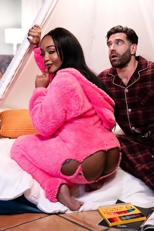 Long-haired ebony Lily Starfire smiles while getting her cocoa pussy drilled