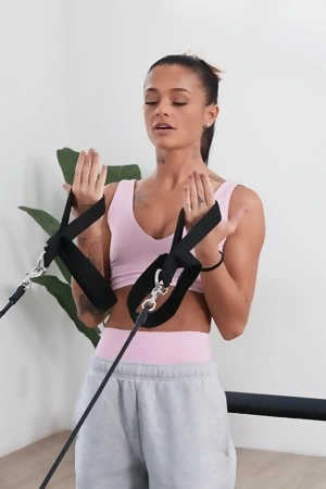 Sporty bimbo Ryan Reid works out on a big throbbing cock