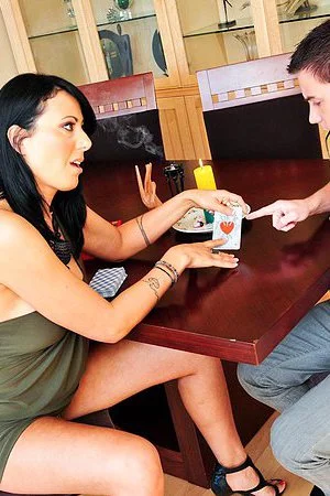 Hot brunette milf Zoey Holloway is rubbing the young dick through the cotton pants