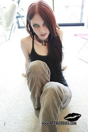 Redhead model Liz Vicious wants to be in the center of attention all the time.