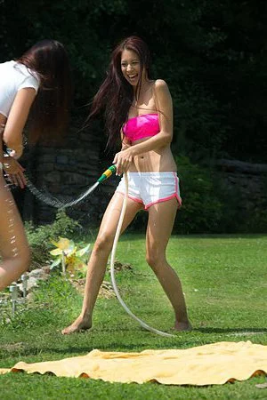 Christy Charming and her girlfriend Casey Jordan have some lesbian fun on the porch