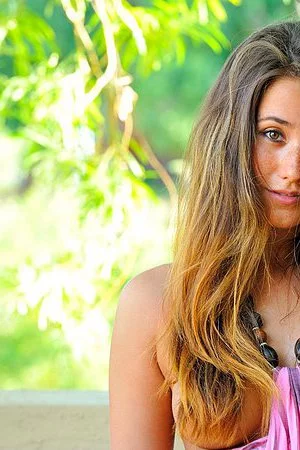 Sexy girl Eva Lovia bares off boobs, lifts up dress and rubs the pussy outdoor