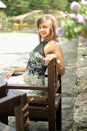 Melena A relaxes outdoors in the afternoon and ends up playing with her salacious pussy