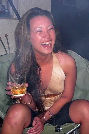 Asian amateur Miko Sinz drinking alcohol before doing her first porn in casting