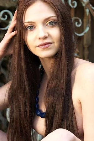 Brunette sweetie Star Renea takes it all off apart from her sexy boots outside the house