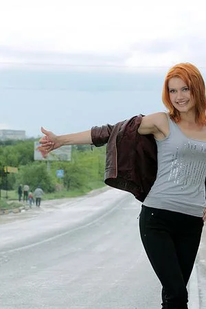 Nothing but the blossoming poppies are hiding the nude body of redhead Violla A