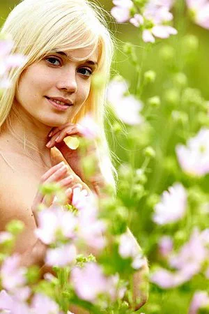 Charming blonde chick Aljena A doesnâ€™t hide her teen body when posing in the meadow