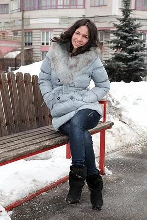 Perfect brunette babe Margo B exposes her flawless body inside as she gets in to warm herself