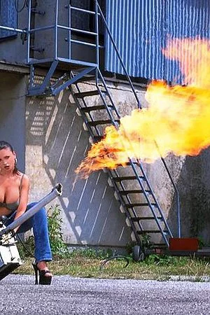 Huge breasted brunette Veronica Zemanova in blue jeans loves to play with fire