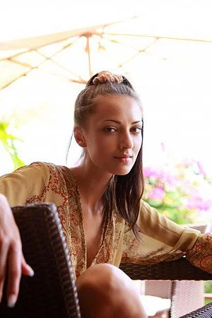 Dazzling brunette chick Anna Aj leaves nothing but her high heels and her necklace on