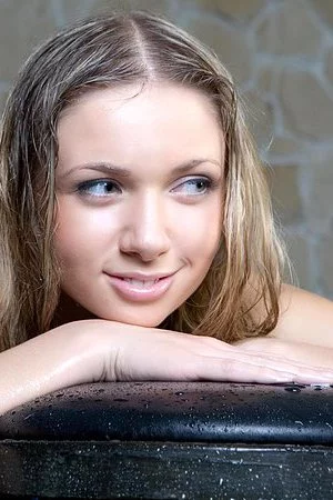 Lithe blonde hottie Augusta Crystal poses naked and lets water pour down on her