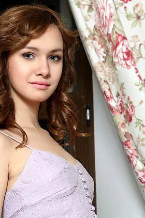 Lovely brunette teen Demetra A strips her dress showing natural pussy and small tits