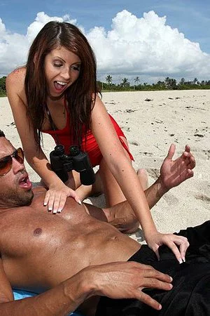 Hot brunette Skyla Paige gets her shaved pussy nailed by horny macho on the beach