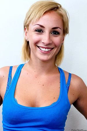 The well shaped bimbo Lexi Swallow is showing body in the tiny shorts and tight top