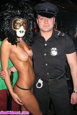 Masked Melissa Midwest in tiny panties shows her fine tits to everyone at the masquerade party 