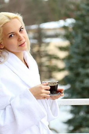 Ravishing blondie Vika D is taking a hot bath and showing off her shaved cooch