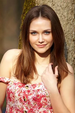 Charming chick Zlatka A is in the thick wood losing off short colorful dress