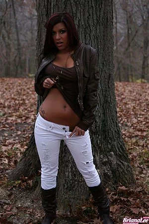 Shameless Latina bimbo Briana Lee strips and shows big full cans in the nature