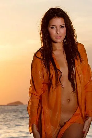 Sexy brunette teen Gracy Taylor enjoys the last warm rays of the setting sun over her nude body