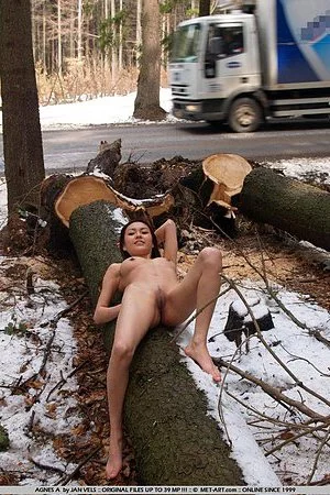 Completely nude slender asian Annie Ling exposes her slit outdoors in public place