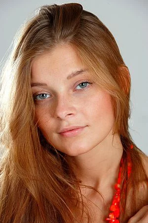 Cute teen doll Indiana A with sexy nude tits hotly poses in nothing but red beads