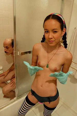 Skinny oriental girl Amai Liu in striped stockings gets impaled on mature meat pole