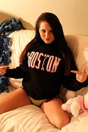 Sultry chick Freckles is showing her pussy and ass through the sheer panty