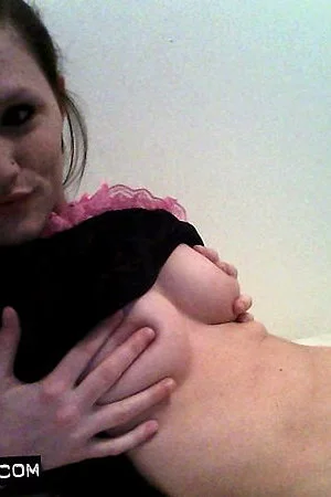 Freckles is a lithe brunette and she is teasing her fans by stripping out of her lingerie in bed