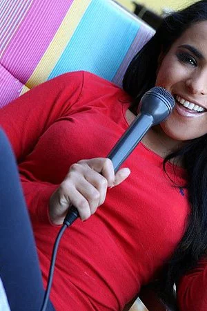 Busty brunette babe Valery Summer has a cam shooting her when she plays with a mic