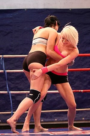 Lucy Bell and Paige Fox having a spectacular lesbians scene together as they fuck in the ring 